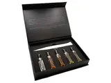 The Discovery Set box open, five minis inside